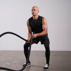 Unconditional Active Darkside Muscle Tank top in black with sleeveless design and athletic fit for active wear.