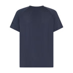 Dark charcoal Ambush Raglan Tee by Unconditional Active, showing the casual, fitted top with contrasting raglan sleeves.