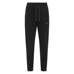 Black Unconditional Active Maverick Session Pant trackpants laid flat showing comfortable fit and elastic waistband.