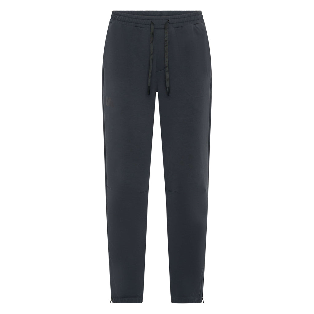 Dark charcoal Unconditional Active Onslaught Everywhere Track Pants laid flat, showing relaxed fit and elastic waistband.