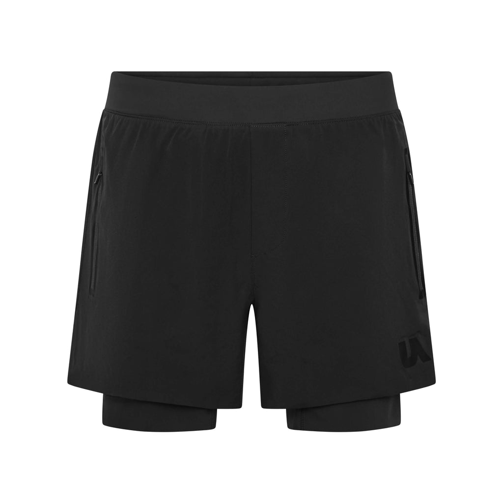 Black Peacemaker 5-inch shorts by Unconditional Active, showing the athletic fit and casual style on a model.