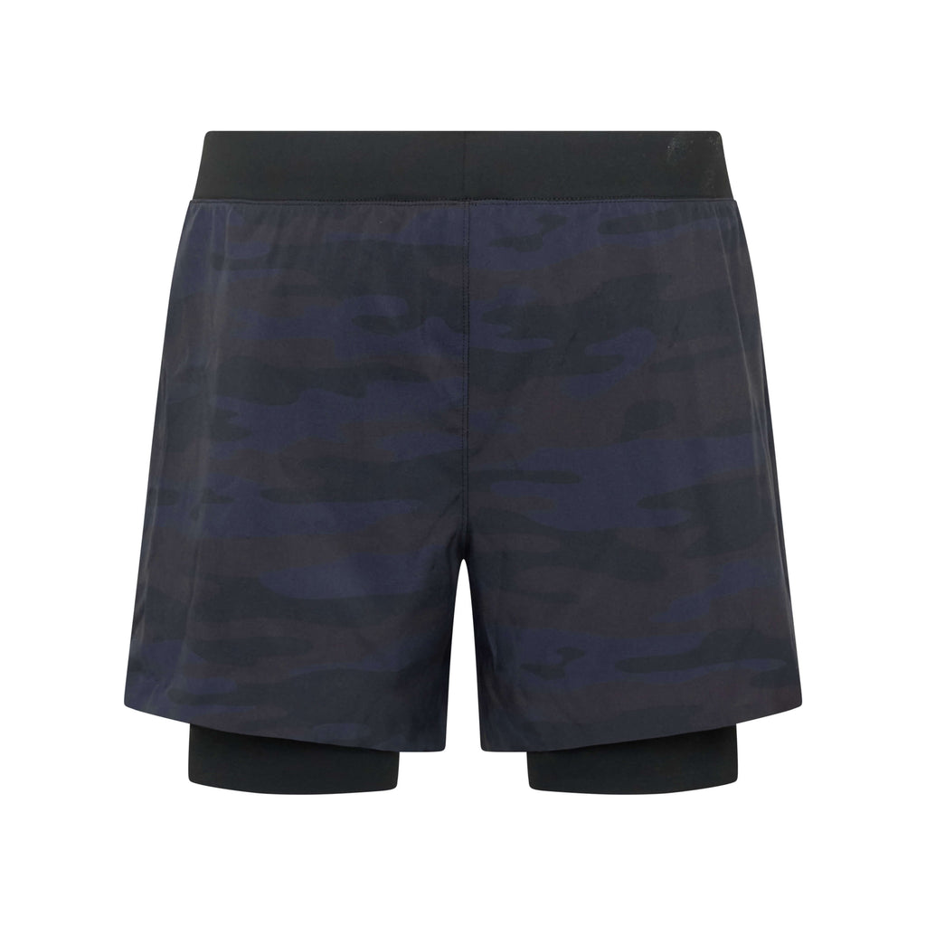 Unconditional Active Peacemaker 5-inch camo shorts laid flat, showcasing their casual fit and camouflage pattern.