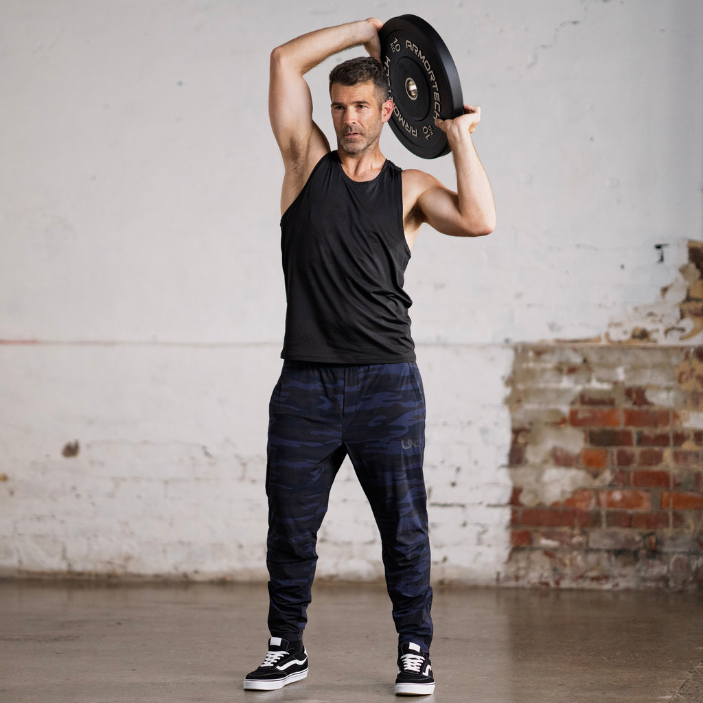 Unconditional Active Maverick Session Pant trackpants in black with elastic waistband and side pockets, casual athletic wear.