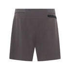 Unconditional Active Taskmaster 5-inch dark charcoal session shorts laid flat, showcasing lightweight breathable fabric and elastic waistband.