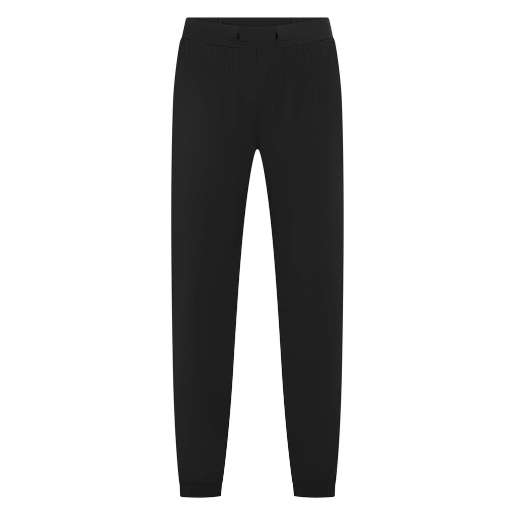 Black Warlock Long Jogger trackpants by Unconditional Active, featuring a relaxed fit and elastic waistband for comfortable wear.