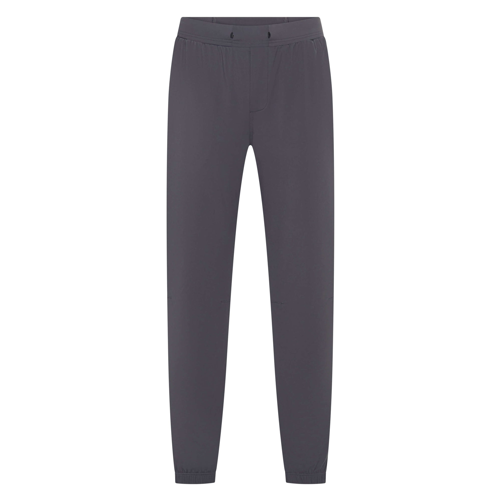 Unconditional Active Warlock Long Jogger trackpants in dark charcoal, featuring a relaxed fit with elastic waistband and tapered design.