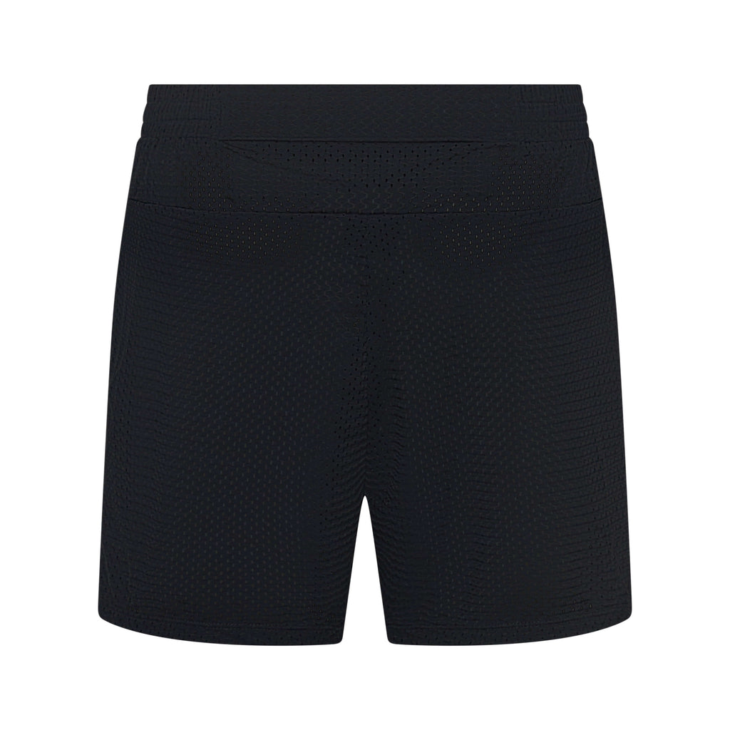Dark black Unconditional Active Wildcat 5-inch mesh shorts shown with lightweight breathable fabric and elastic waistband.