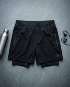 2-in-1 performance shorts — Flat Lay - Styled | Generated by Modelize